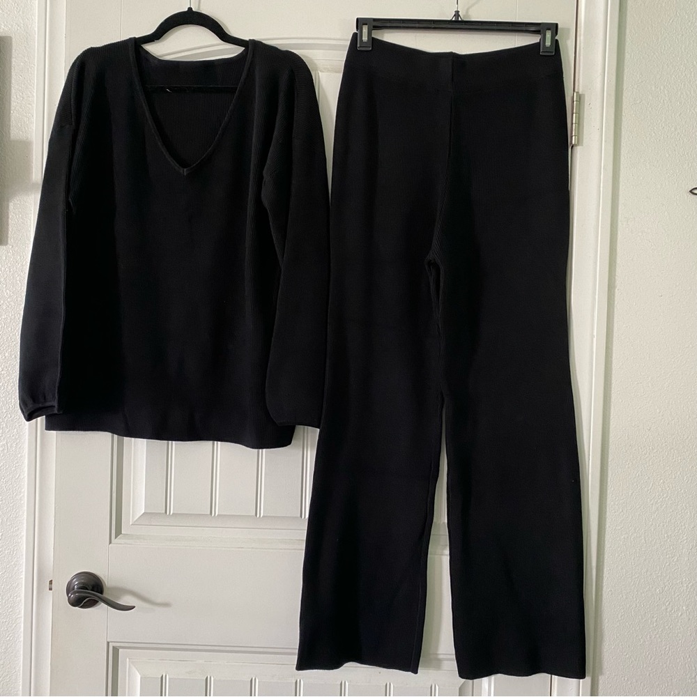 New XL Black knit sweater and matching pants. Very stretchy fits like a 2X